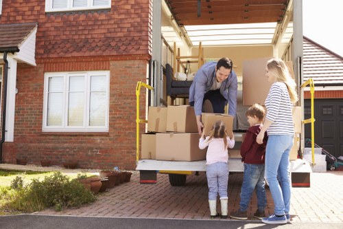 Professional movers handling furniture in a residential move