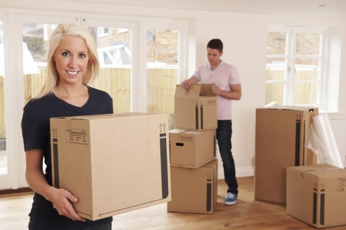 Professional removals van operating in a Kingston upon Thames street