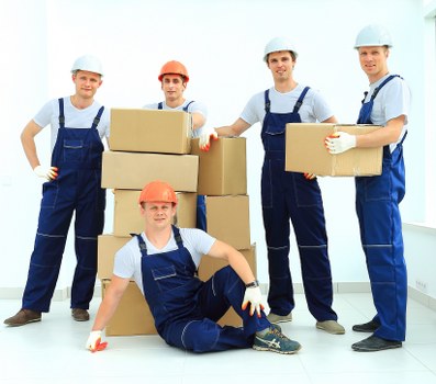 Unpacking household belongings into a new Kingston upon Thames home