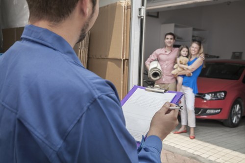 A moving van parked near a residential street in Kingston upon Thames