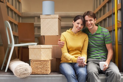 Removal team handling furniture and boxes for a Kingston move