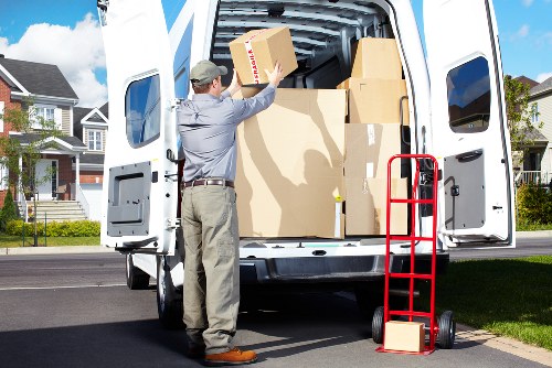 Boxes and furniture being loaded for a Kingston removal service