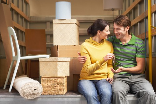 Packed moving boxes and furniture for a local home removal