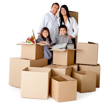 Packed moving boxes and furniture ready for a home removal